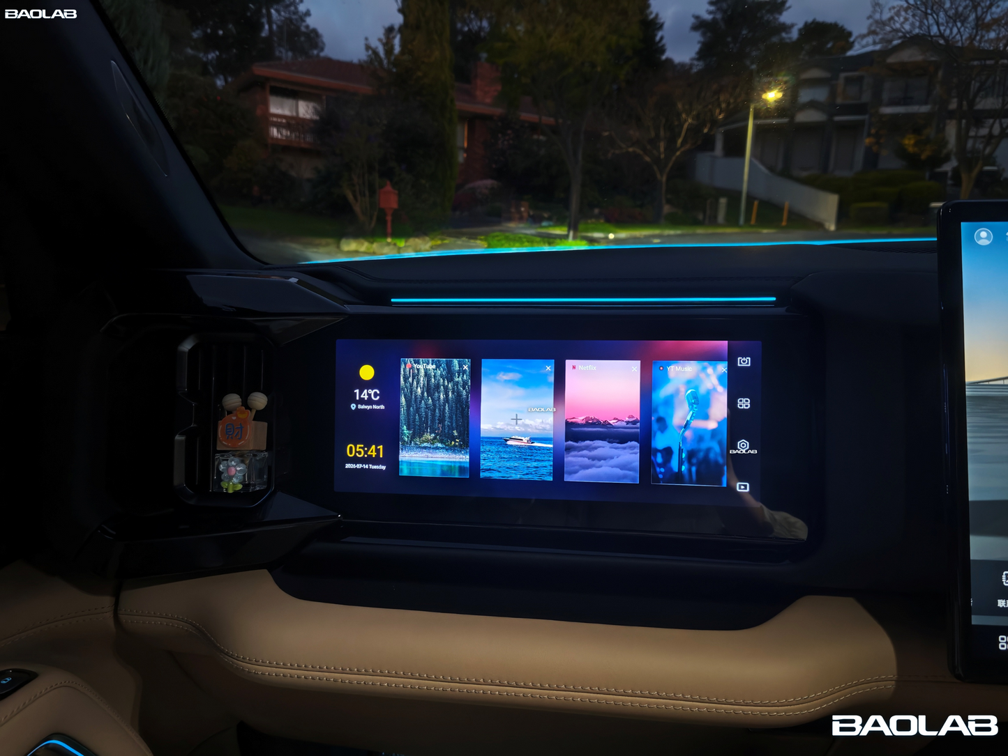 Denza B8 interior showcasing the passenger entertainment screen at night