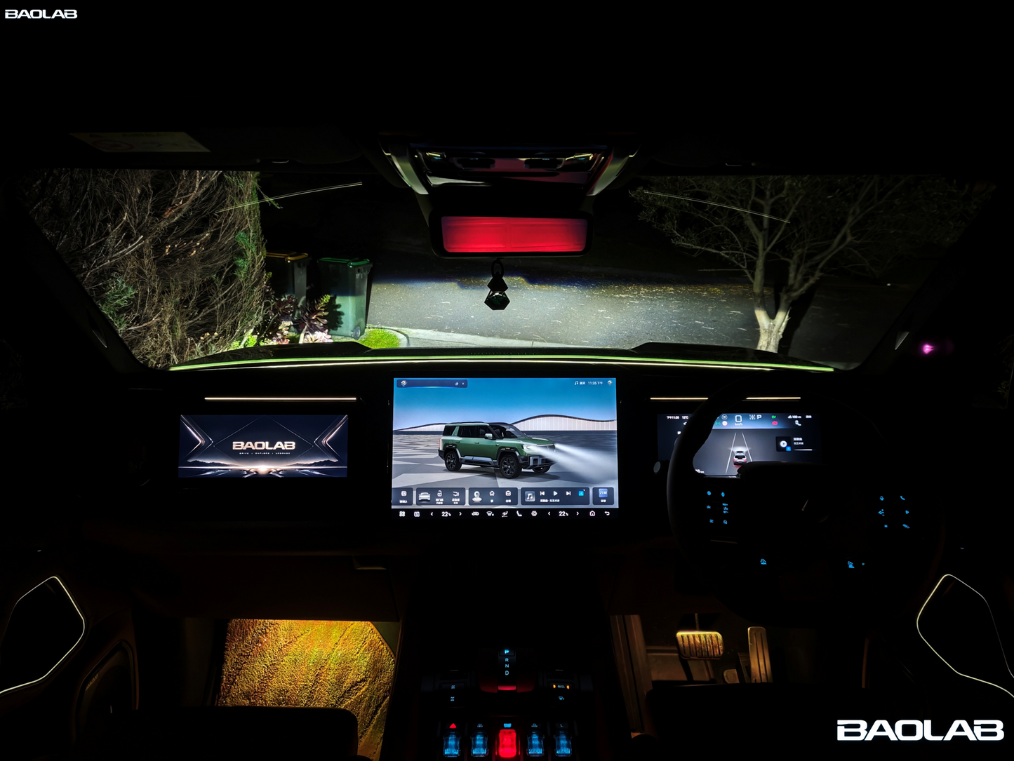 Modern Denza B8 interior with glowing dashboard, ambient lighting, and three screens displaying vehicle controls and navigation.