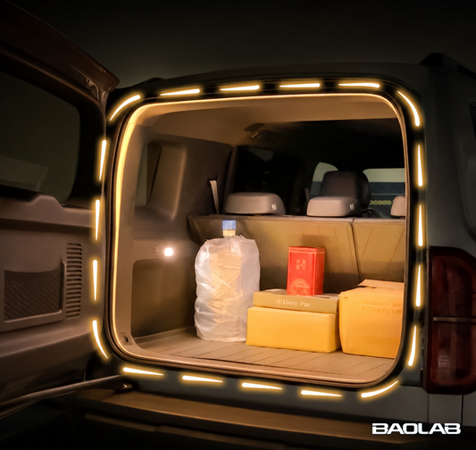 Denza rear cargo opening with hidden perimeter boot light illuminated around the full tailgate opening.